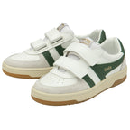 Two white Gola sneakers with green stripes, beige soles, and two white Velcro straps.