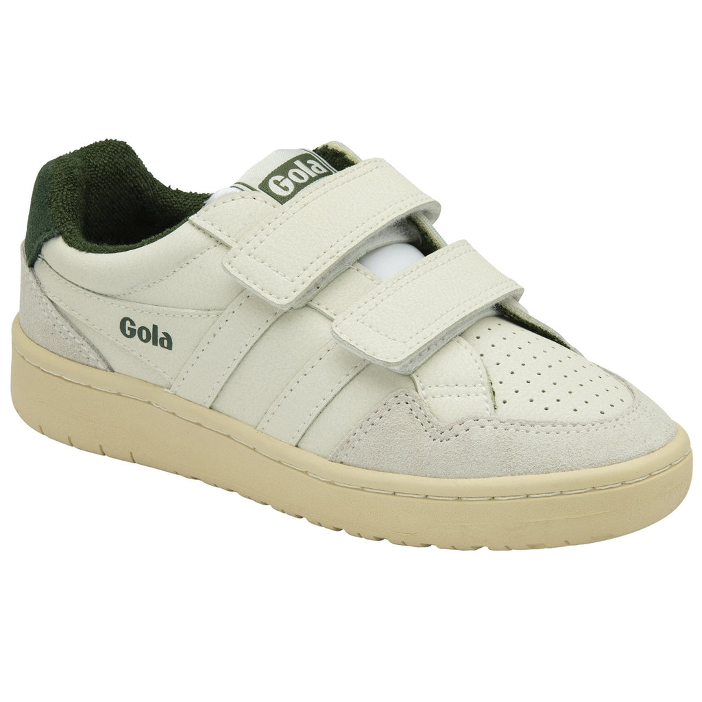 A child's white Gola sneaker with green accents and velcro straps, viewed from an angle.