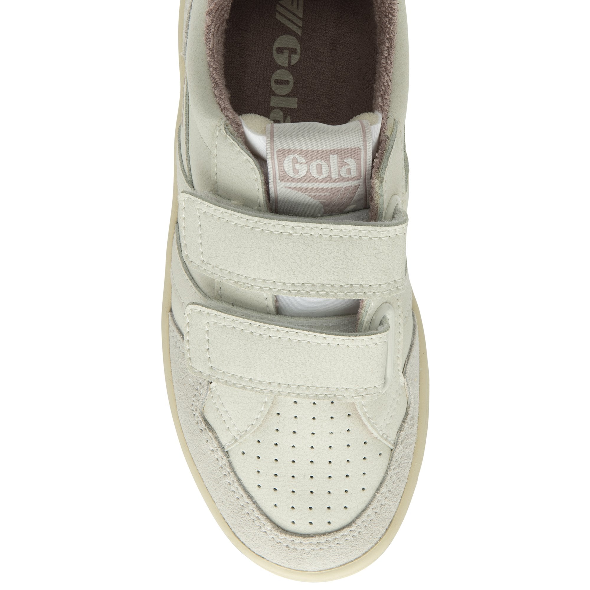 Top down view of a white Gola children's trainer with two velcro straps and perforated toe.