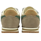 The back view of a pair of Gola kids' trainers in gold and green.