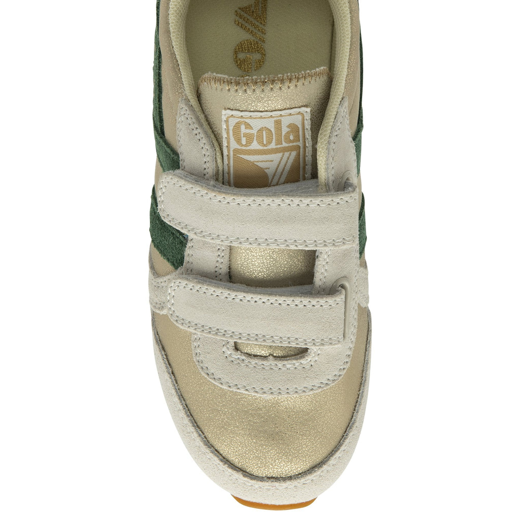 The top-down view of a single Gola kids' trainer in gold and green.