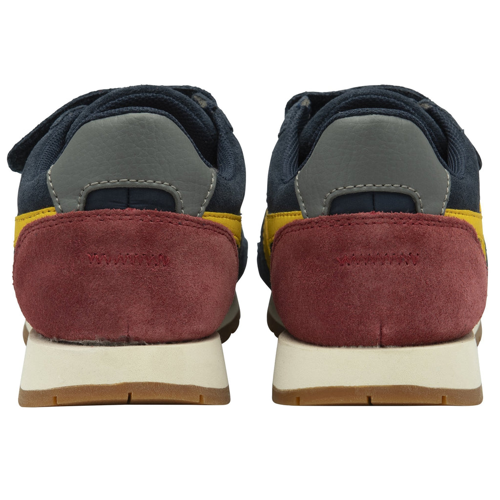 Back view of the two navy, yellow, and red Gola boys' trainers.