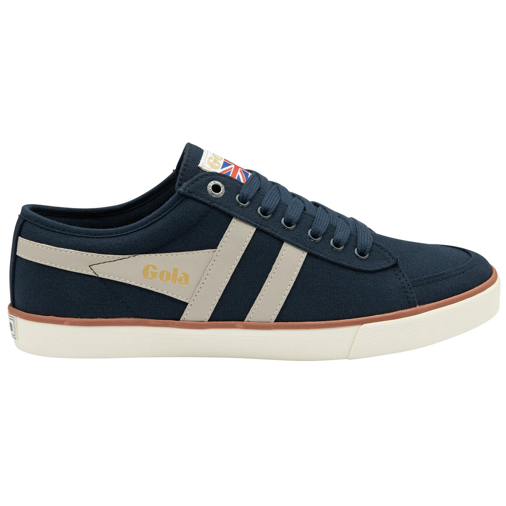 A single blue Gola men's sneaker, with two cream stripes on the side, displayed on a white background.