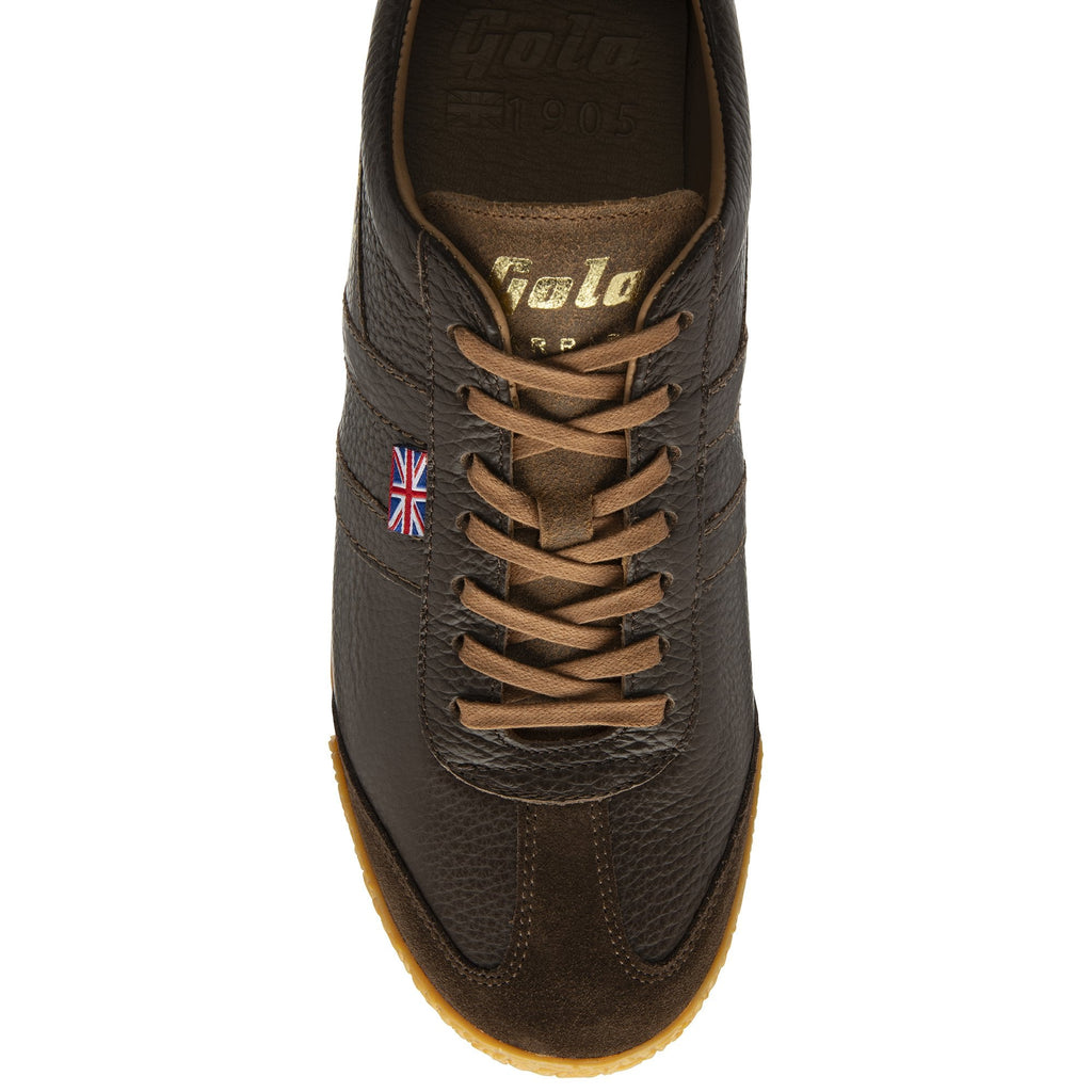 Top down view of a dark brown leather Gola trainer with tan laces. 