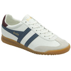 A white Gola sneaker with blue stripes and a gum sole, viewed from an angle.