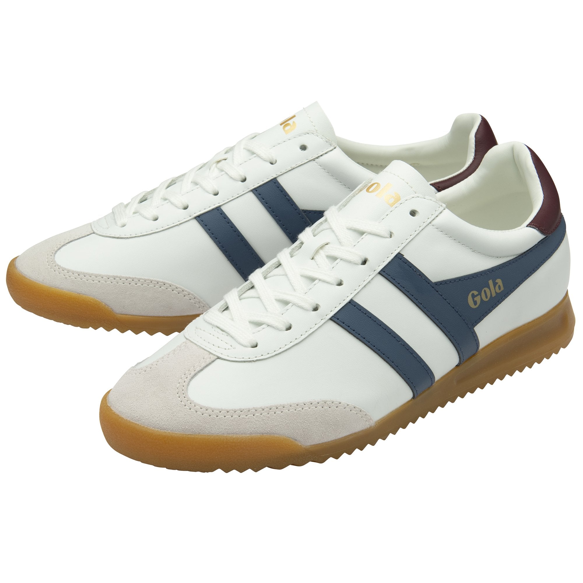 A pair of white Gola sneakers with blue stripes and gum soles, viewed from an angle.
