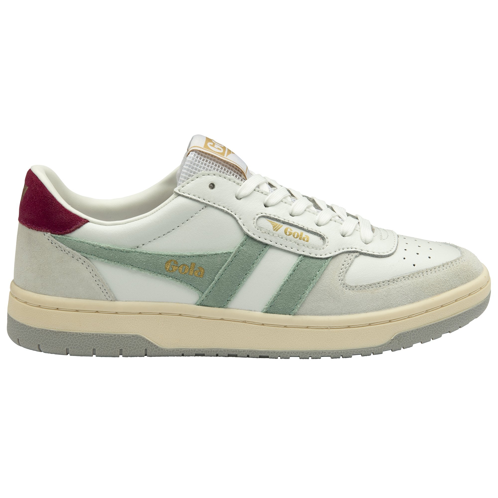 Side profile of a white sneaker with green stripes and a maroon heel tab.