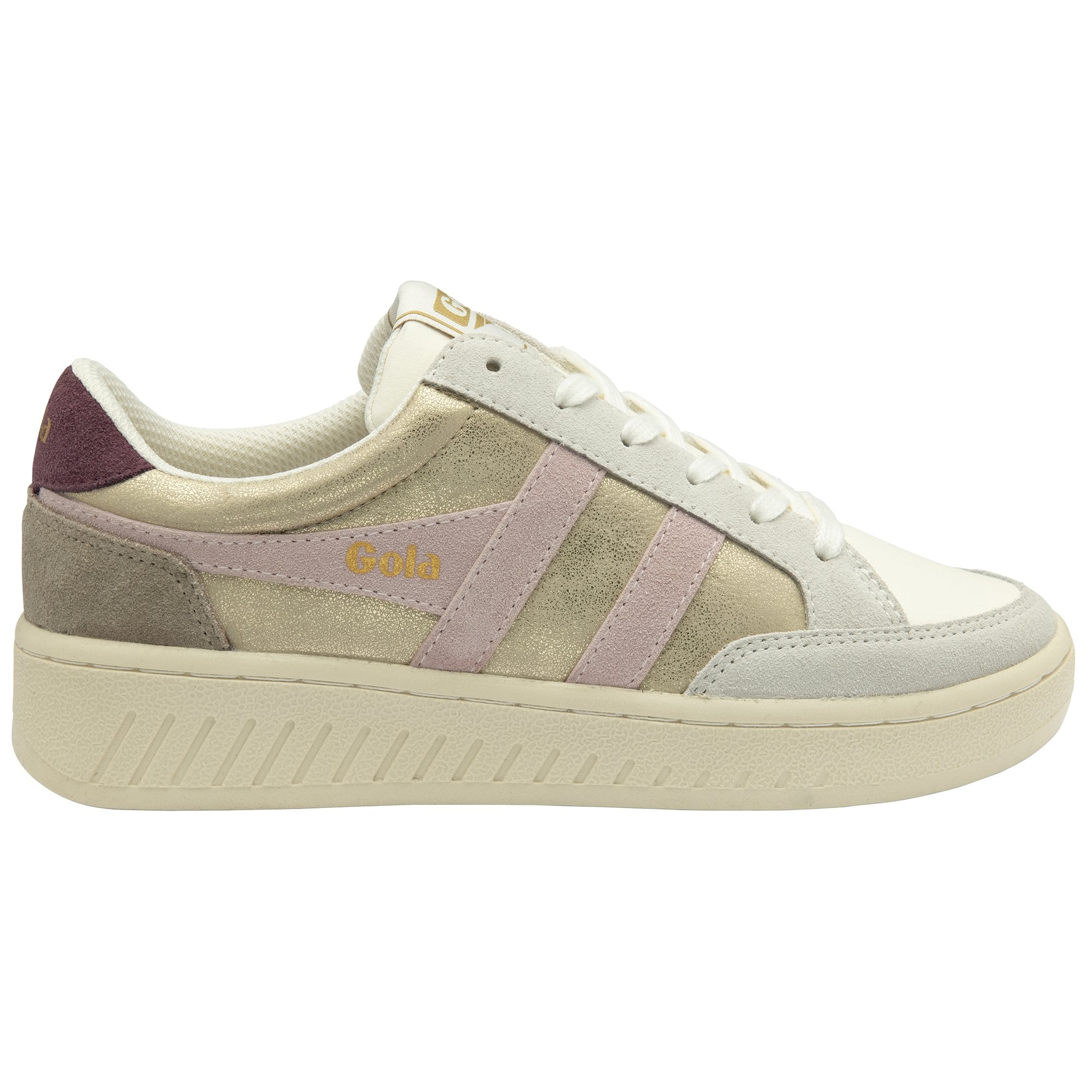 A single Gola low-top sneaker in gold, white, and pink, angled to the right.