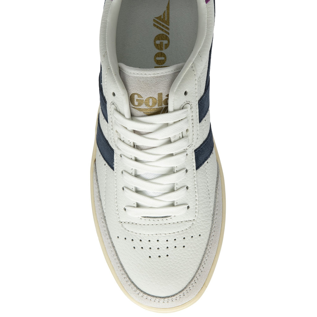 An overhead view of a single white trainer with two navy stripes on a white background.