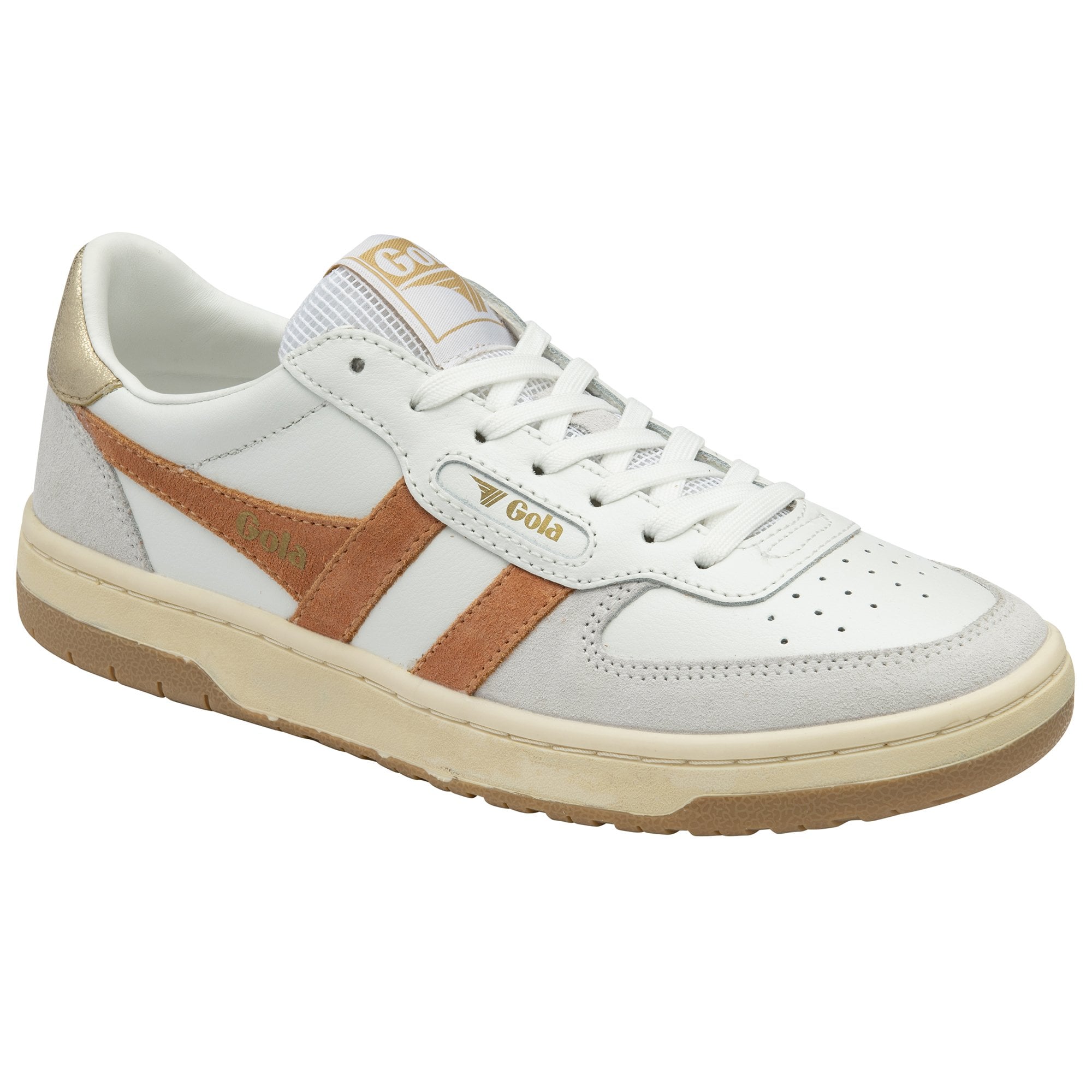 A white and gold sneaker with a white midsole and a brown outsole.