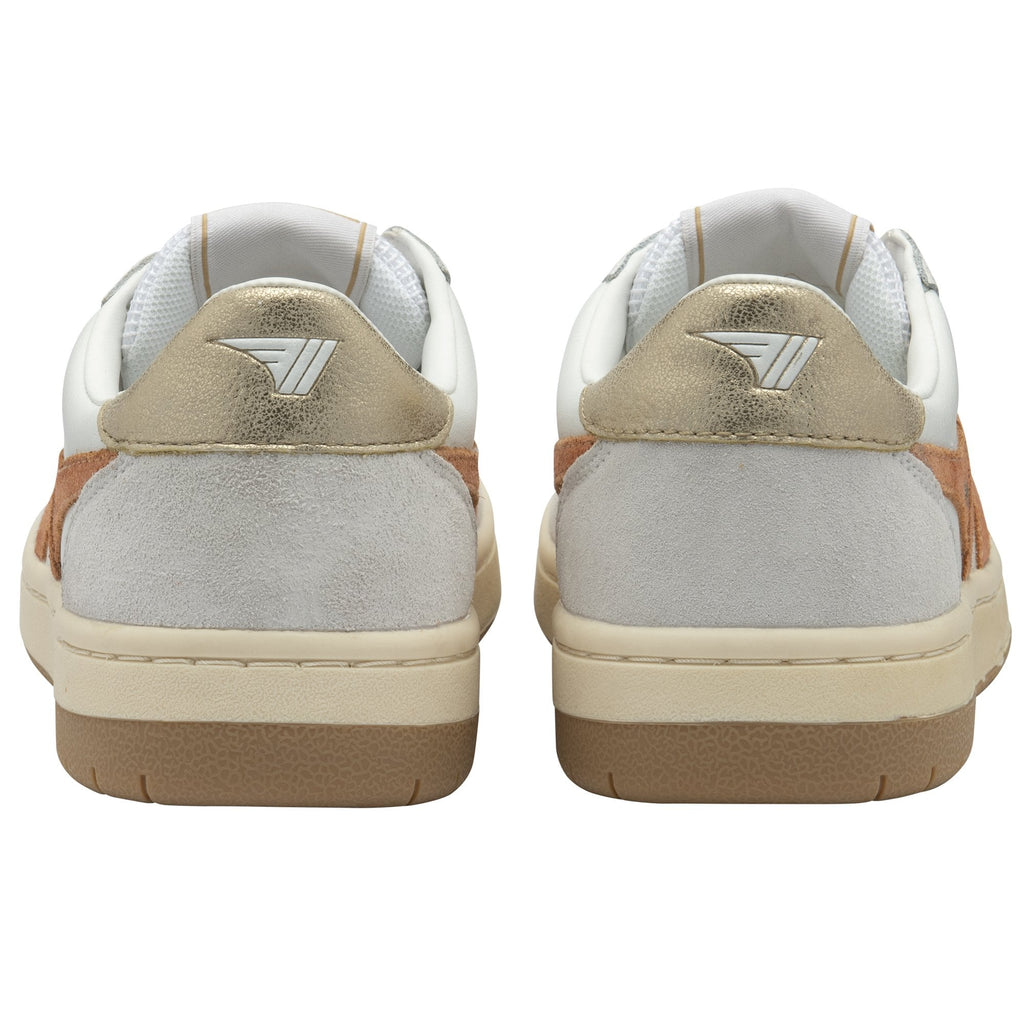 The back of two white and gold sneakers with white midsoles and brown outsoles.