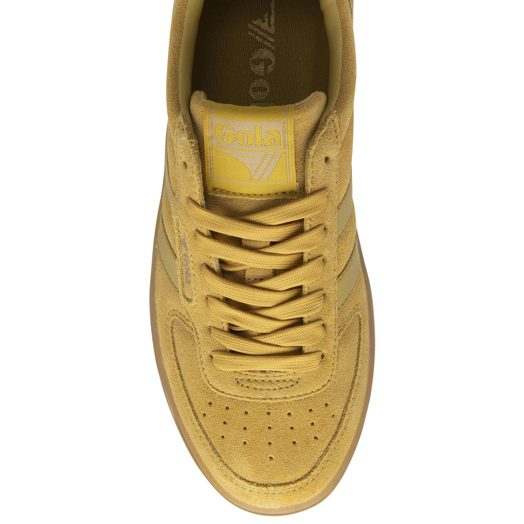 A single mustard yellow Gola trainer with a gum sole, viewed from the top.