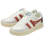 A pair of white Gola sneakers with rust-colored stripes and blue and black accents.