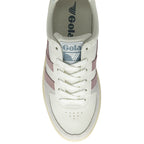 The top view of a white, pink, and green Gola sneaker.
