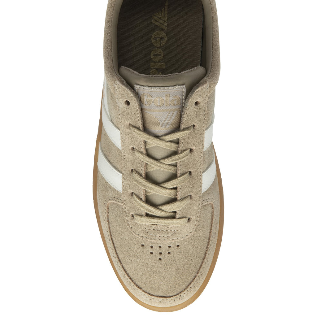Top down view of a beige Gola sneaker with white stripes and matching laces.