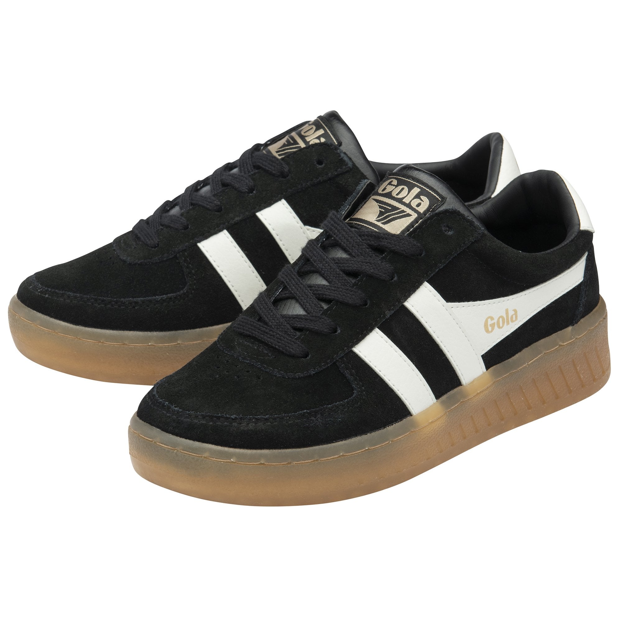 Pair of black and white Gola low-top sneakers with gum soles, viewed from an angle.