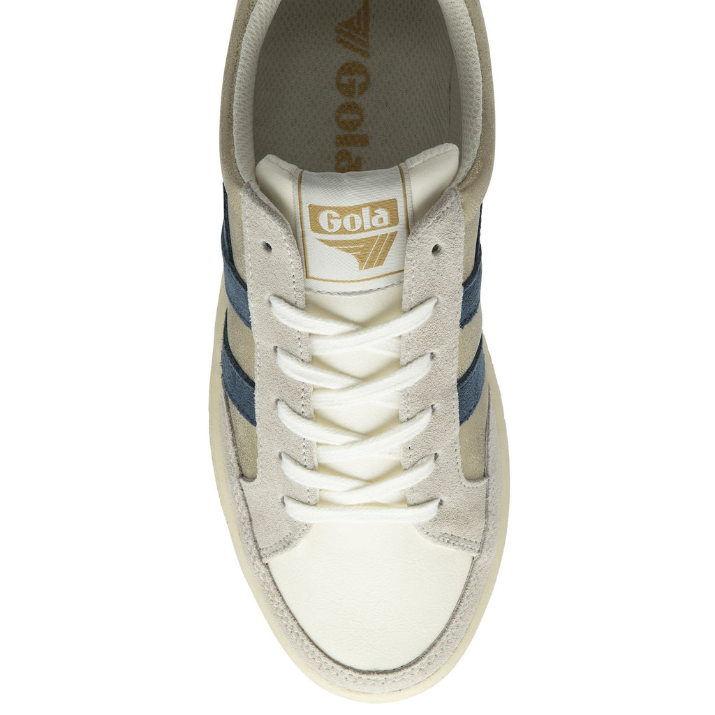 An overhead view of a Gola shoe with white laces and blue stripes.