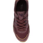 A top-down shot of a single Gola shoe in red.