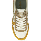 A top-down view of a white, gold, and red Gola sneaker.