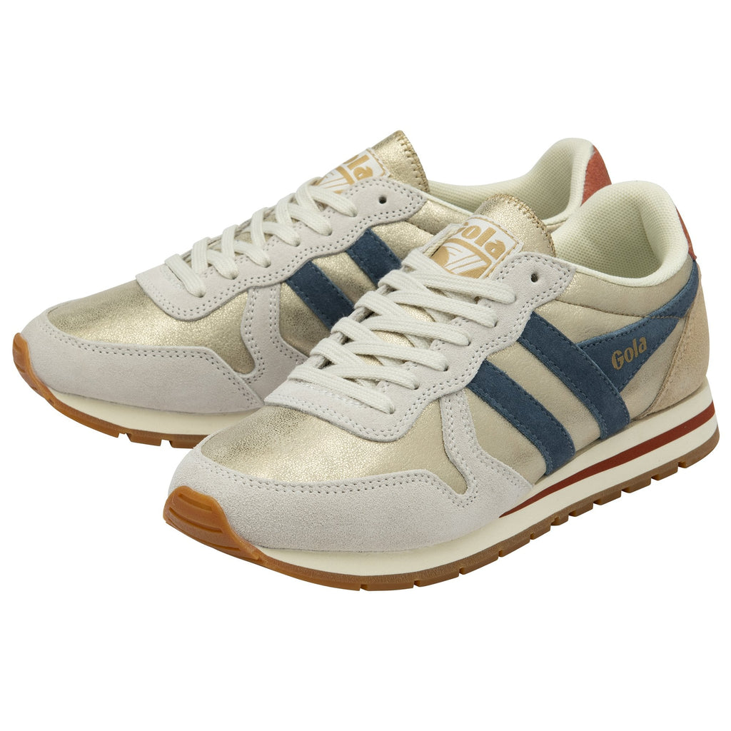 Pair of Gola Daytona sneakers in gold, off-white, and blue with a red stripe on the sole