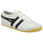 A white Gola sneaker with black stripes and a tan sole, viewed from a slight angle.