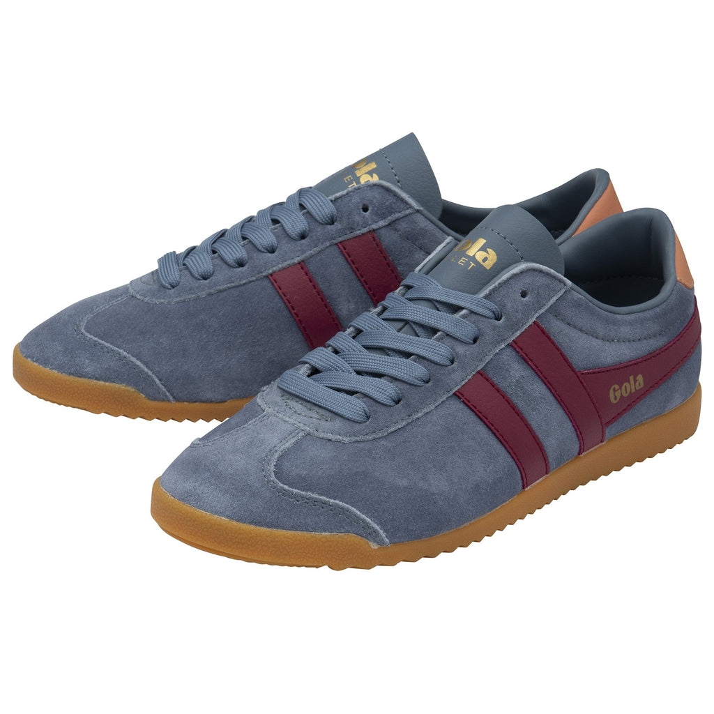 A pair of Gola Bullet Trainers in grey suede with burgundy stripes and brown soles.