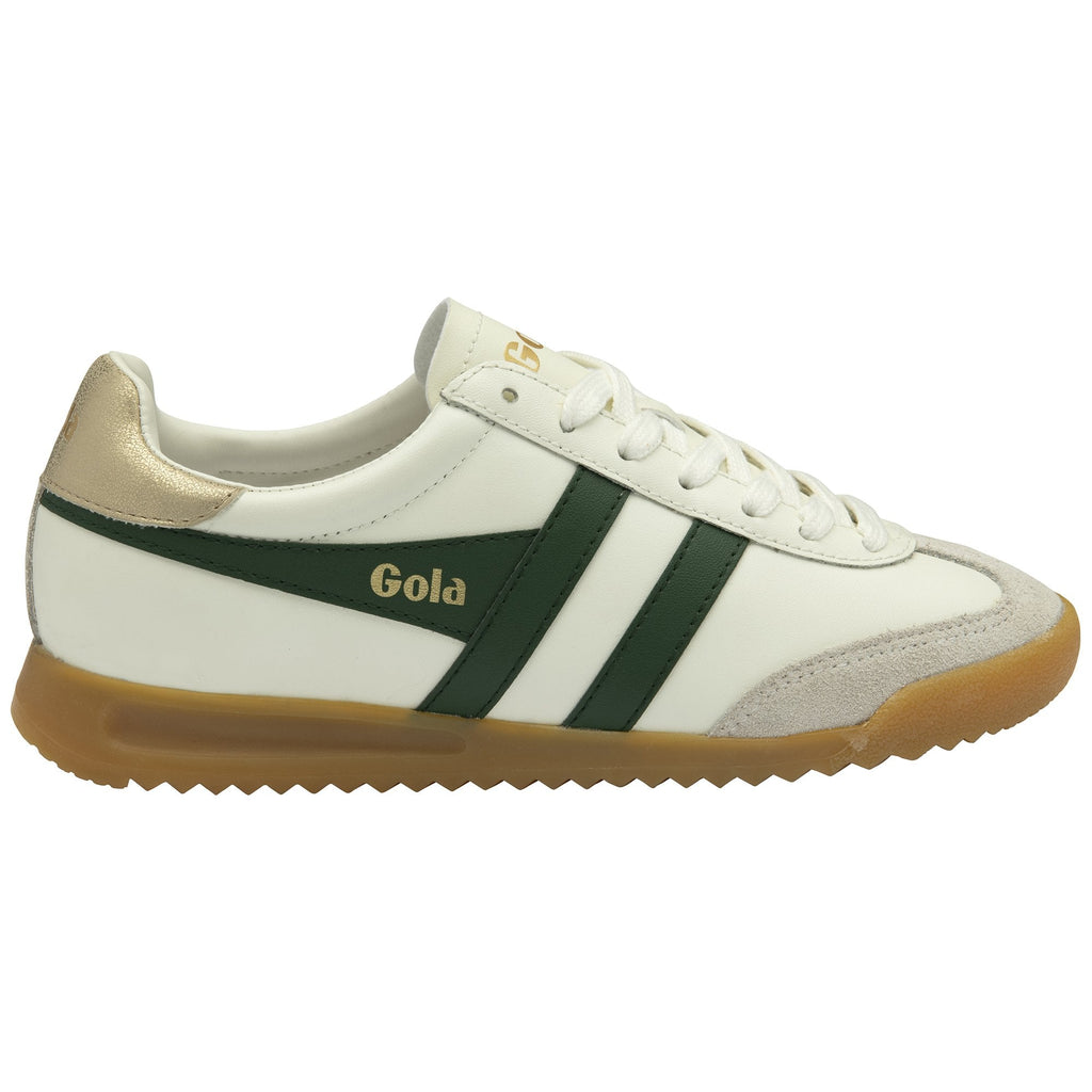 A side profile of a Gola Elan trainer in off-white, green, and gold with a gum sole.