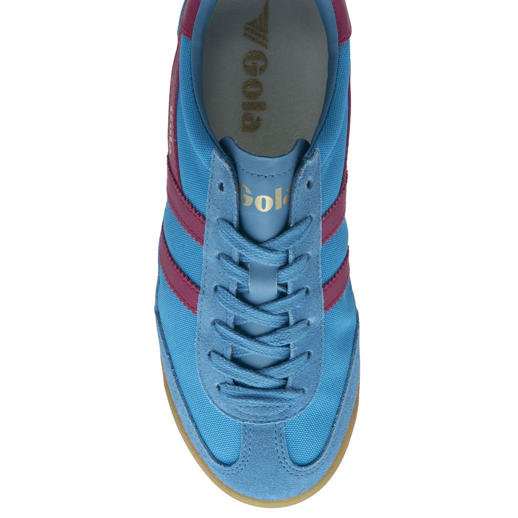 Top down view of a single Gola Harrier sneaker in light blue with pink stripes and brown sole.