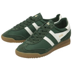 A pair of green and white Gola trainers with brown soles, viewed from an angle.