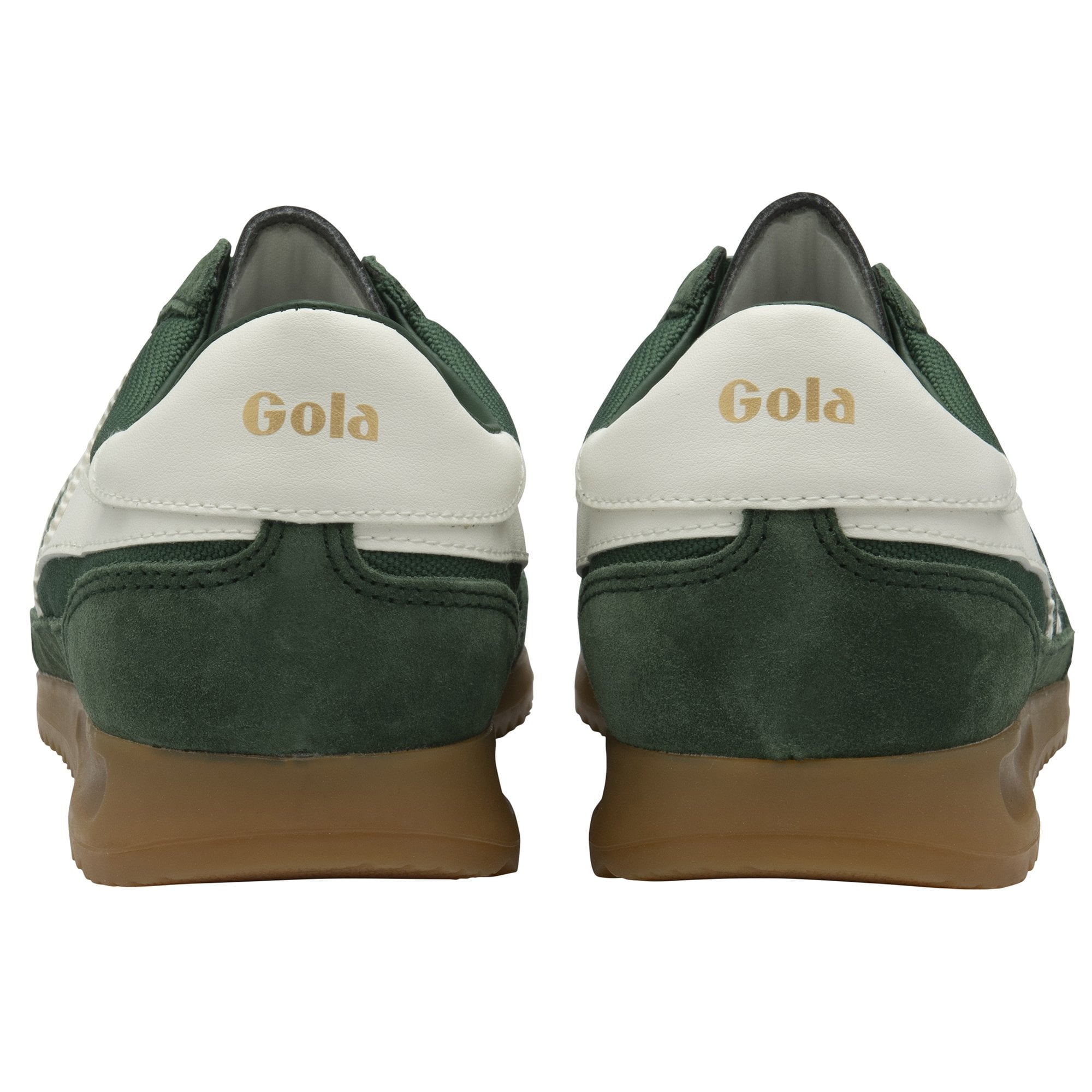 The back of a pair of green and white Gola trainers with brown soles.
