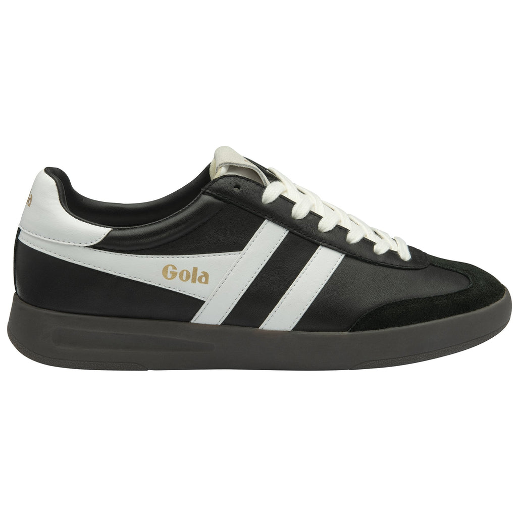 A single black and white Gola trainer with cream laces on a white background, viewed from the side.