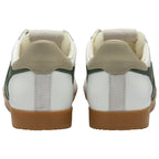 Back view of two white Gola sneakers with green accents and tan soles.