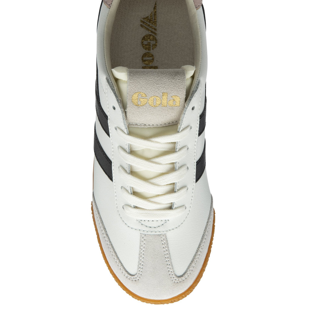 A top-down view of a white Gola sneaker with black stripes and a gum sole.