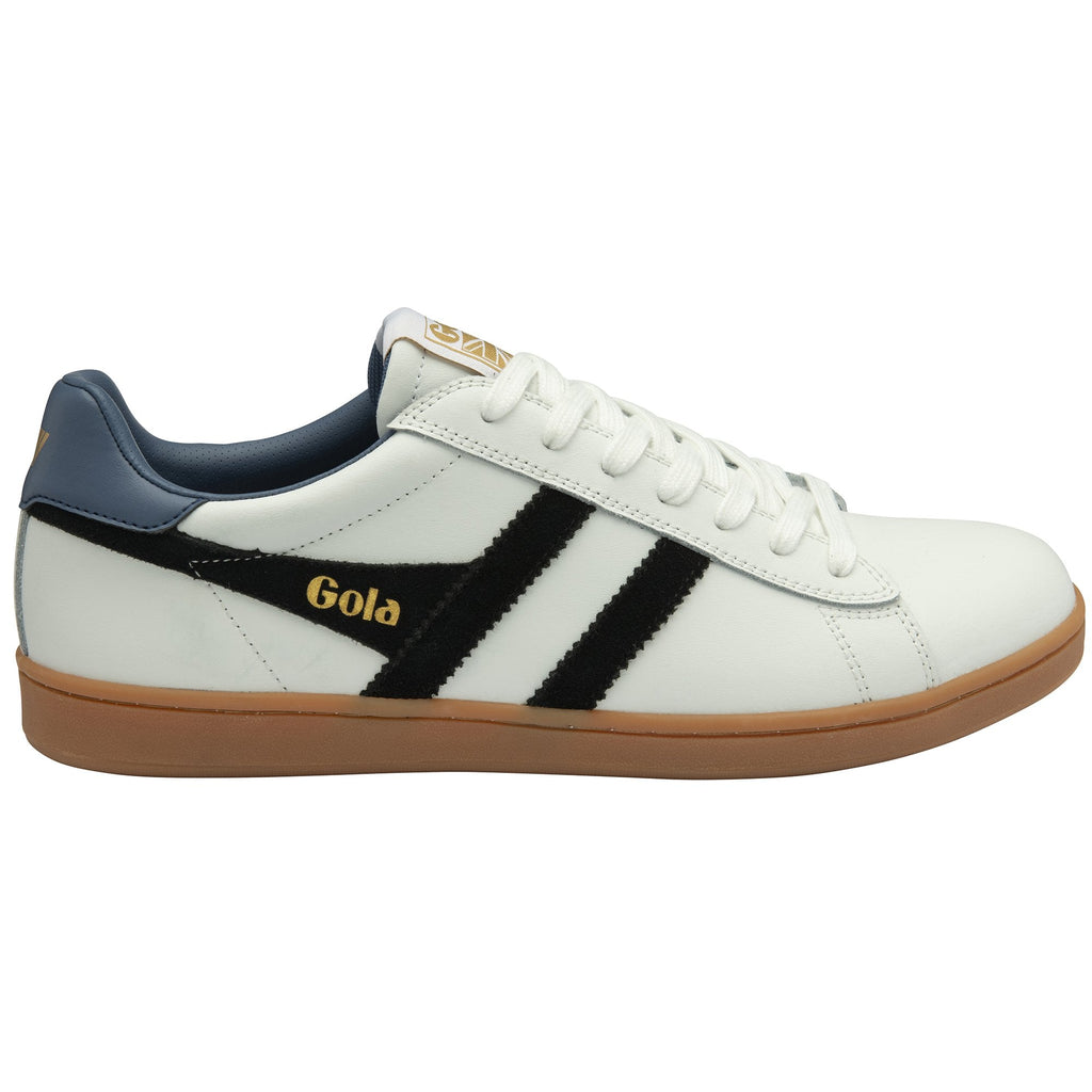 Side profile of a white sneaker with black Gola stripes and gum sole.