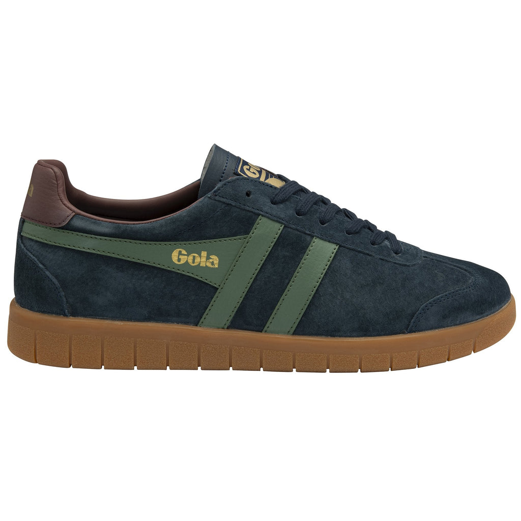 A casual Gola men's shoe in dark blue suede, with a gum sole and green side stripe detail.