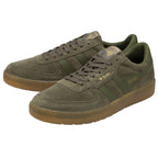 A pair of Gola low-top sneakers in dark green suede with gum soles.