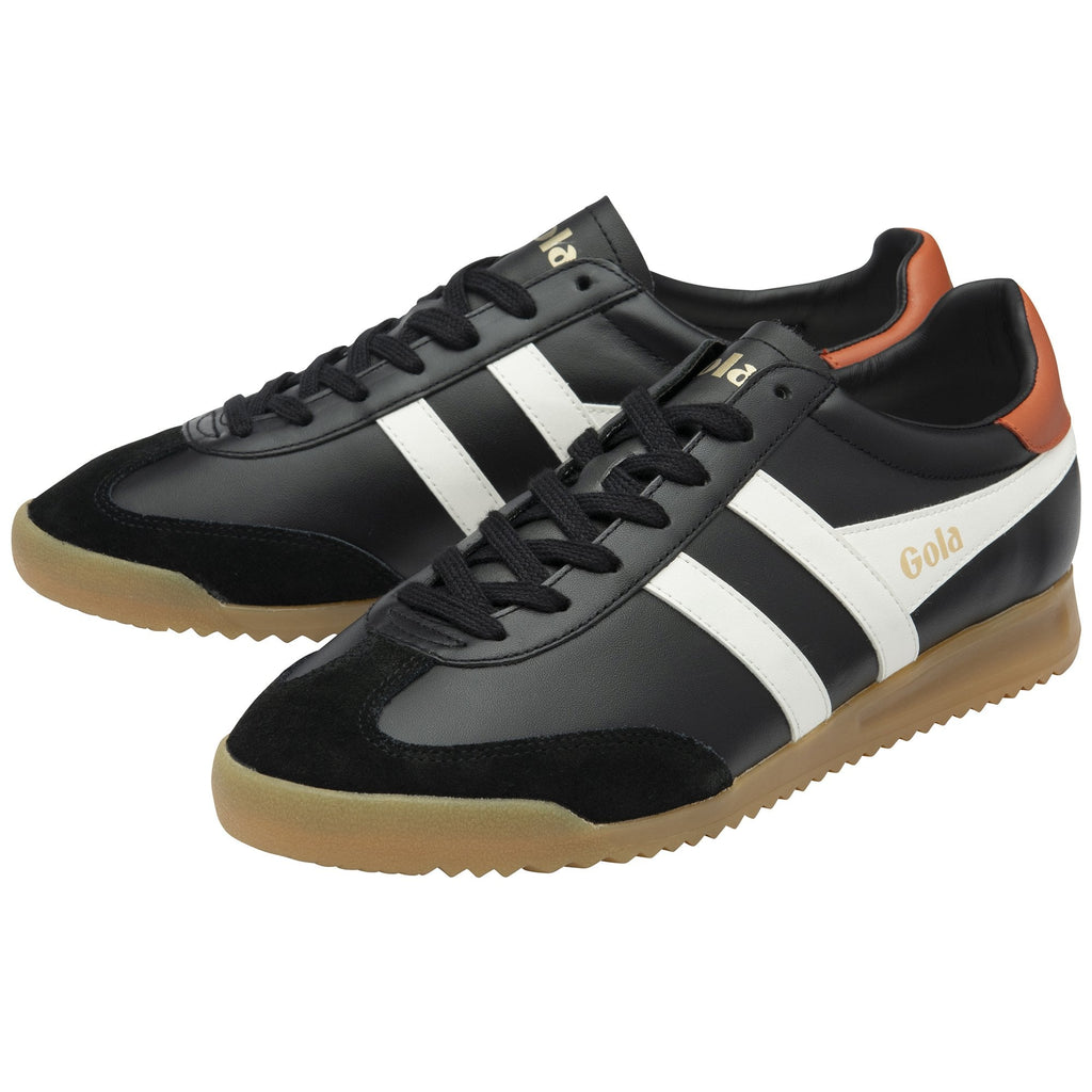 Pair of black and white Gola low-top sneakers with a gum sole.