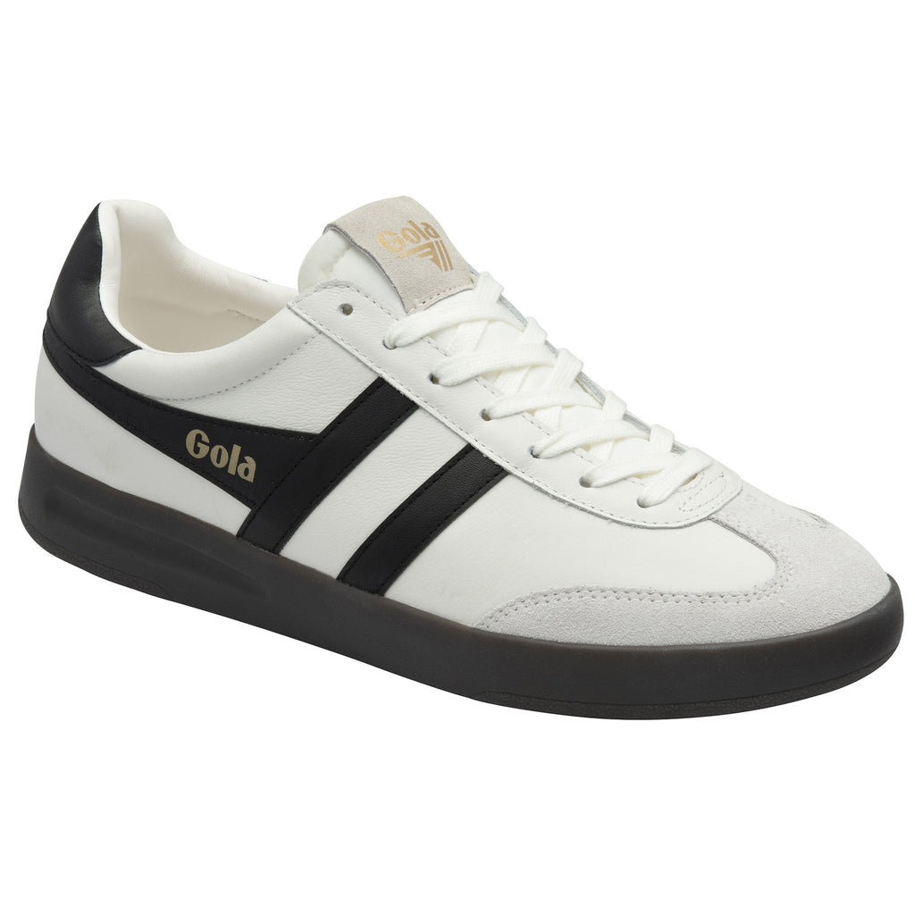 Angled view of a white Gola sneaker with black stripes and a black sole.