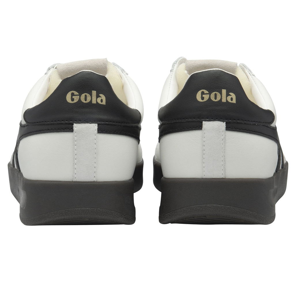 Back view of two white Gola sneakers with black heels and black soles.