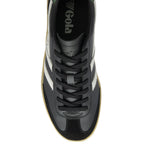 An overhead view of a black Gola sneaker with white stripes.