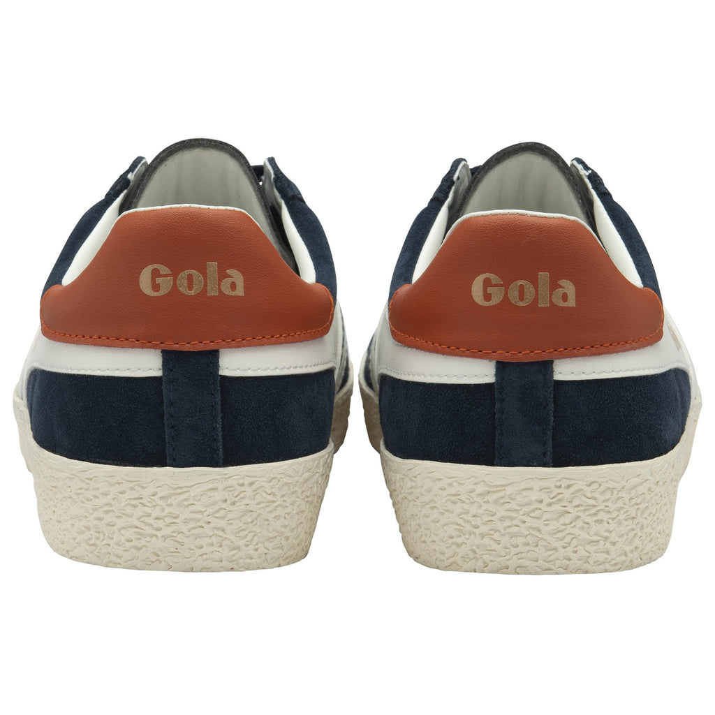 Rear view of two navy Gola Harrier sneakers, showing brown heel tabs with 'Gola' logo.