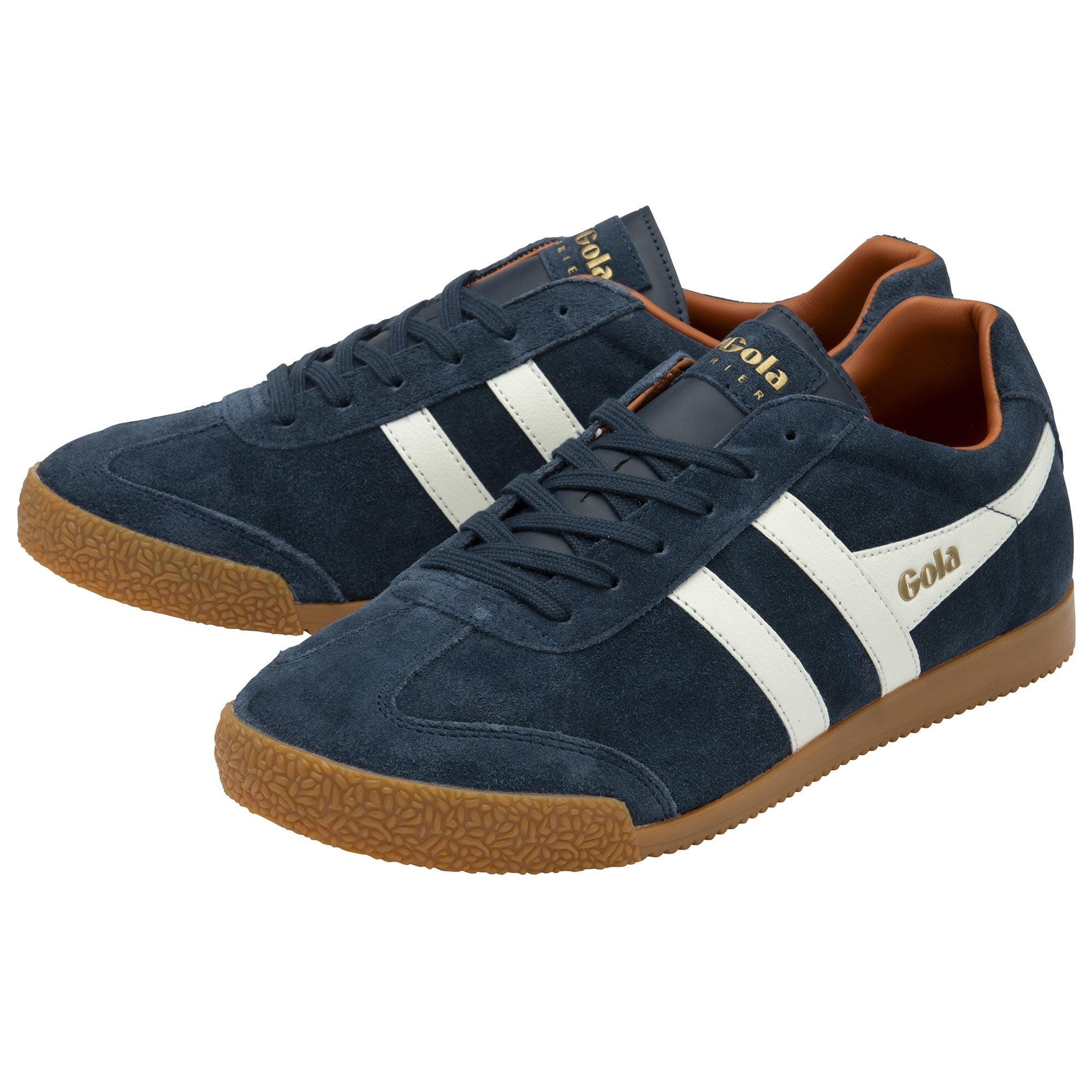 A pair of men's navy blue Gola Harrier suede trainers with white stripes on a white background.