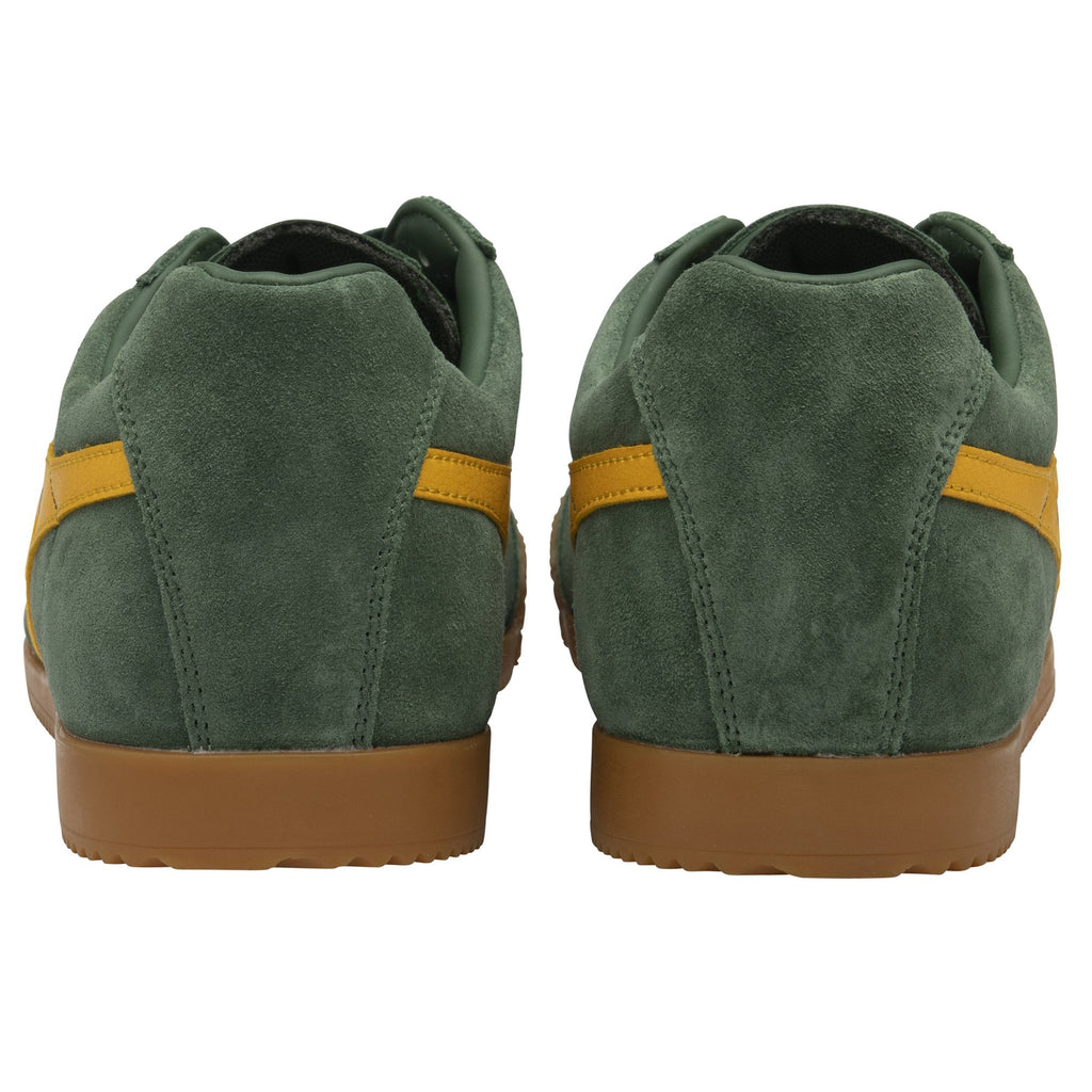 Back view of a pair of men's dark green Gola sneakers with gold stripes and a gum sole.