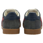 Rear view of a pair of gray Gola shoes with navy heels.