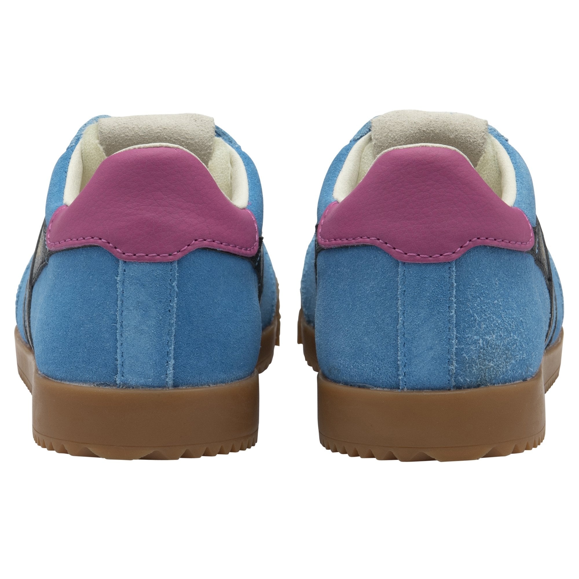 Rear view of a pair of light blue suede sneakers with vibrant purple heel accents.