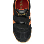 A top-down view of a black and orange Gola kids trainer with velcro straps.