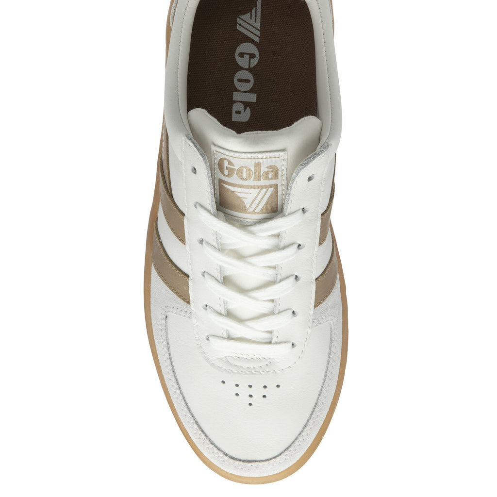 The top-down view of a single white and brown Gola sneaker.