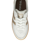 The top-down view of a single white and brown Gola sneaker.
