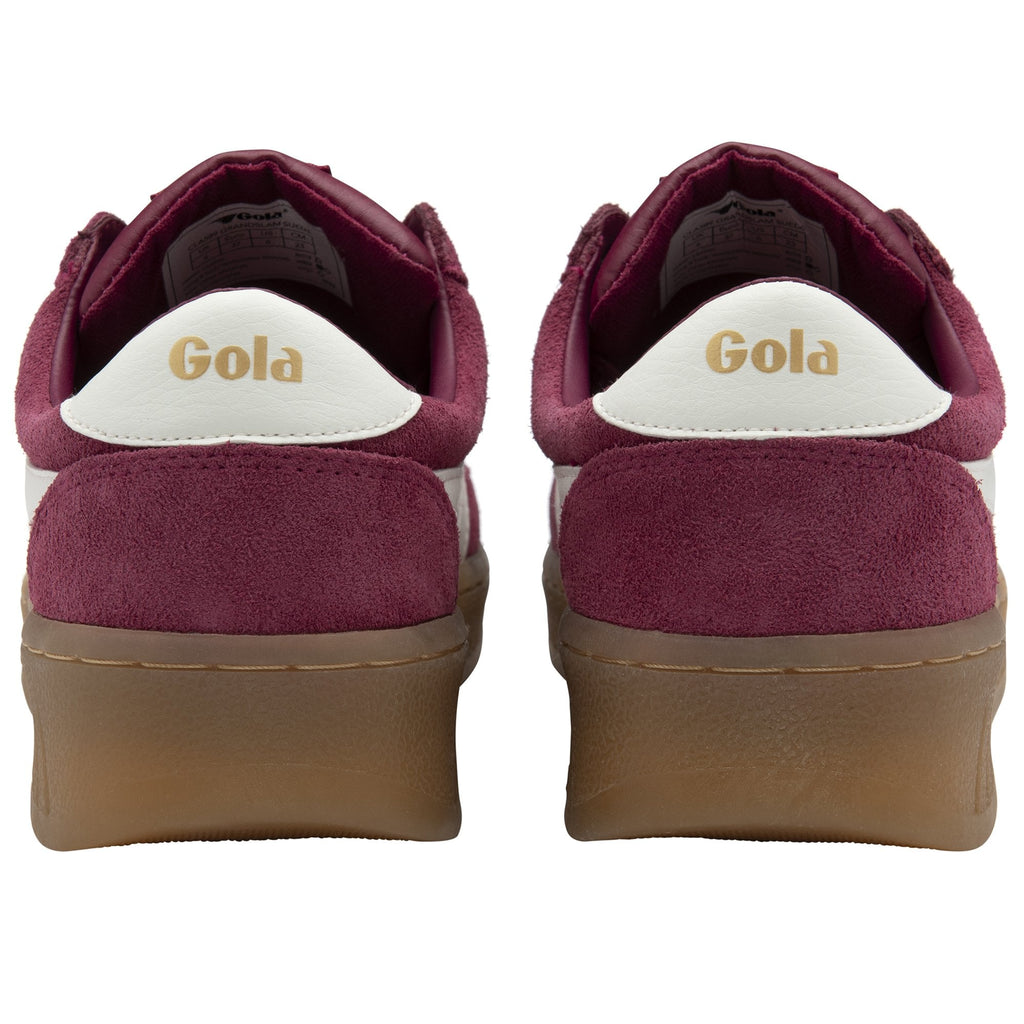 A pair of Gola men's sneakers in burgundy with white stripes from a back angle.