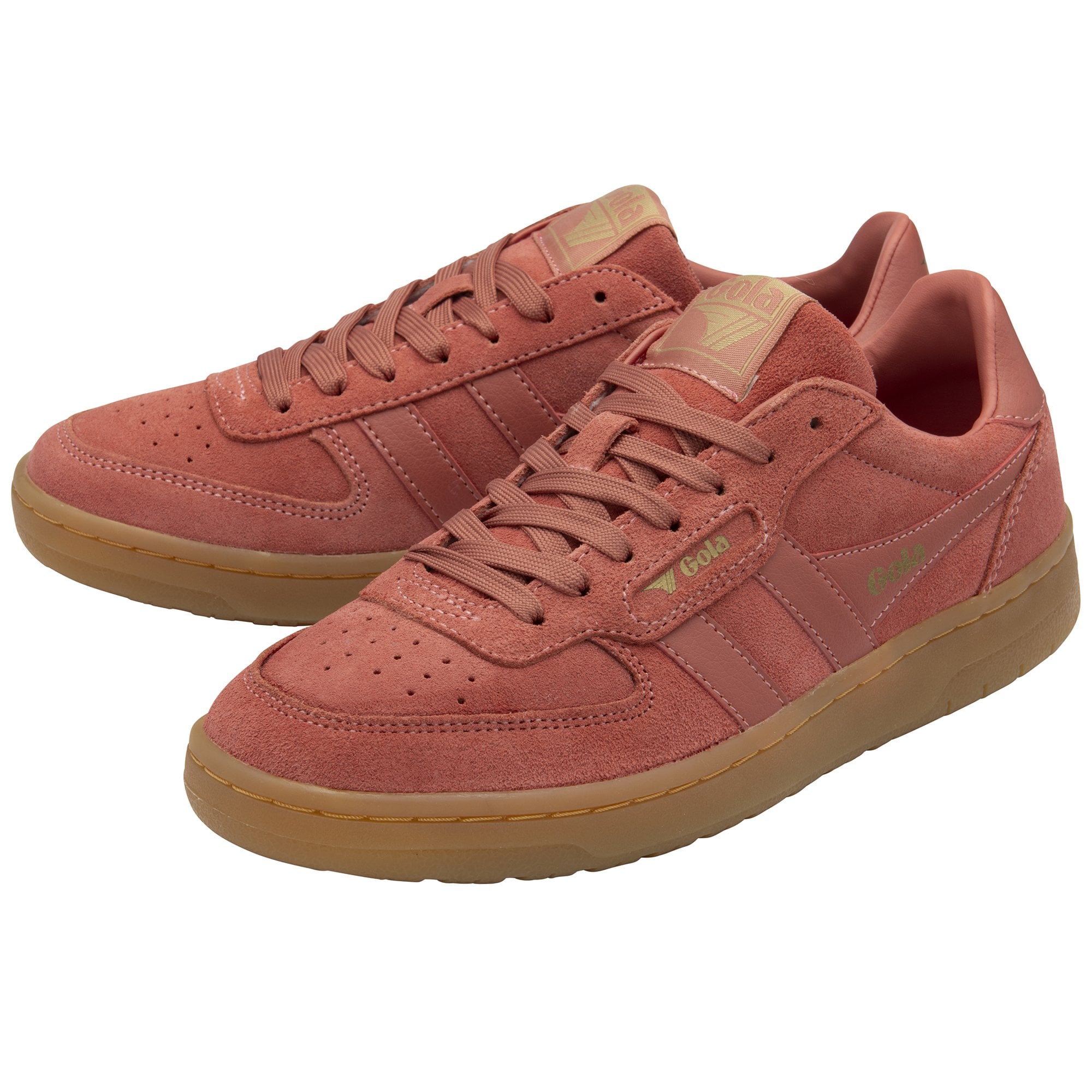 A pair of red-brown suede sneakers with gum soles, positioned at an angle.